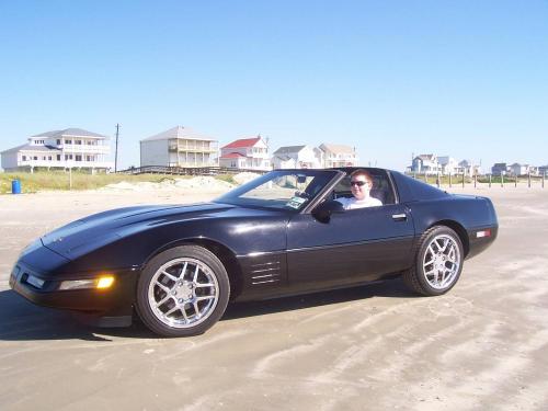 Driving the Vette on the beach in Galveston.